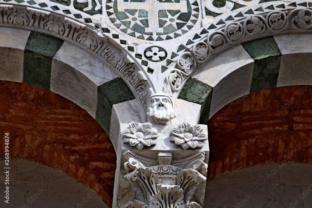 detail of the arches on the facade of the Cathedral of Lucca