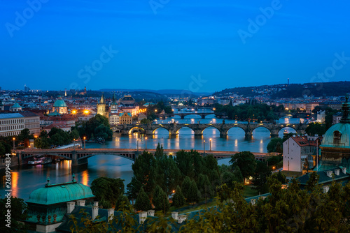 Beautiful Prague and its bridges at night / Aerial night view of famous bridges in Old Town of Prague in Czech Republic over Vltava river