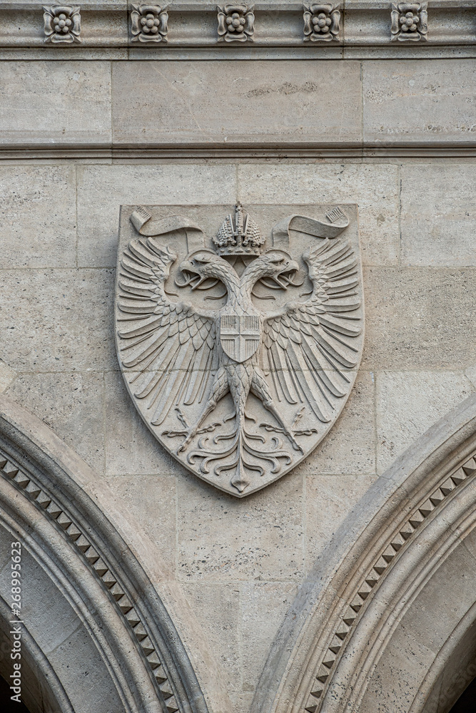 Heraldic Coat of Arms as decoration elements at facade of main city hall (Rathaus) in Vienna, Austria