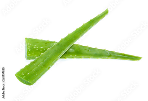 Fresh aloe vera leaves with water drops isolated on white