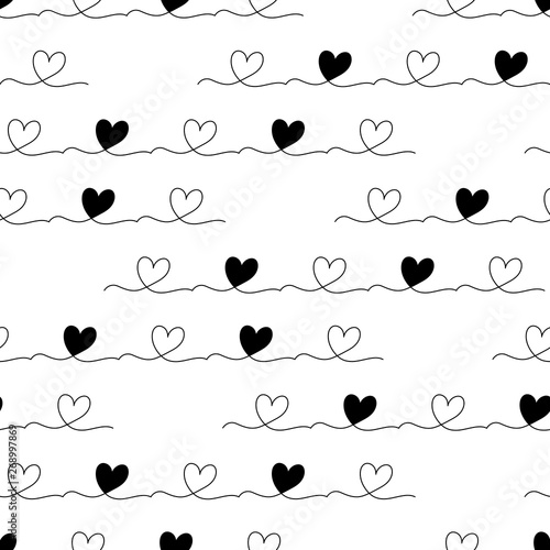 Vector seamless pattern. Hand drawn scribbled hearts monochromatic pattern. Sketched texture. Black elements isolated on white background. photo