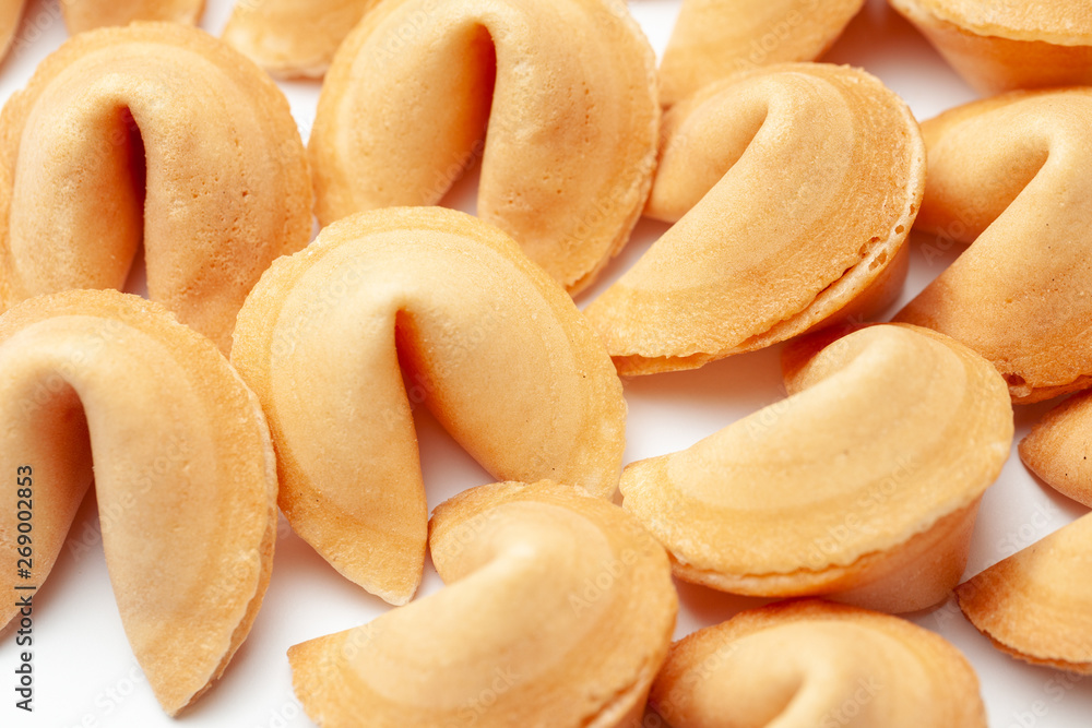 Chinese fortune cookies. Cookies pile with blank blank inside for words prediction. Isolated on white background. Chinese fortune cookies. Cookies pile with blank blank inside for words prediction. Isolated on white background.