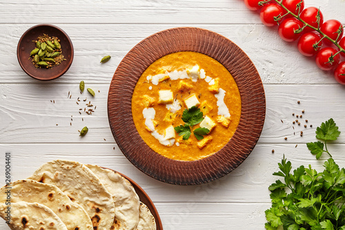 Obraz na plátně Shahi paneer traditional Indian vegetarian masala gravy meal vegetables, white s