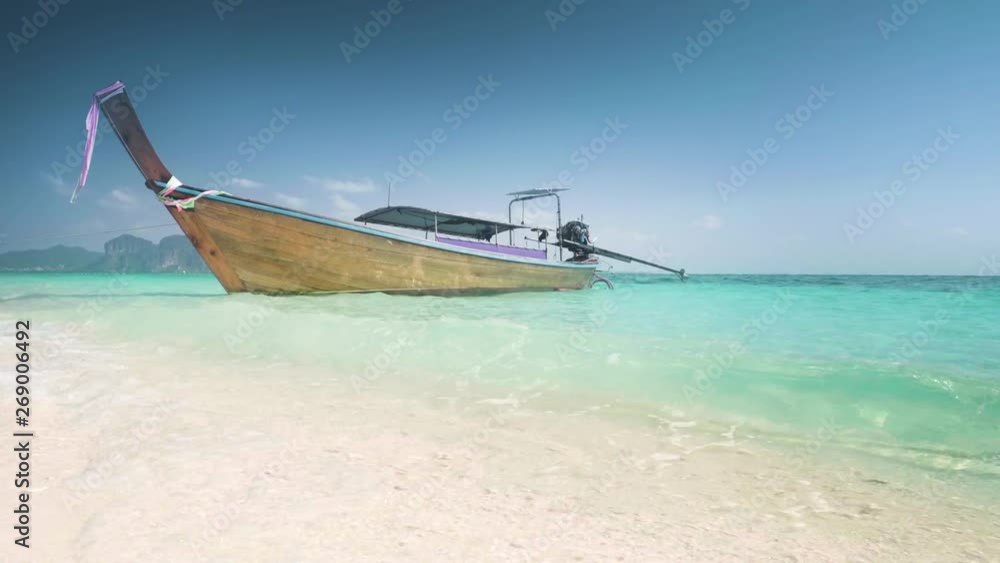 traditional wooden longtail boat at Koh Poda island, Ao Nang, Thailand traditional wooden longtail boat at Koh Poda island, Ao Nang, Thailand