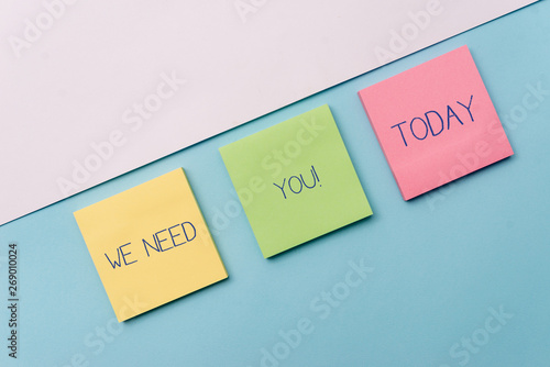 Text sign showing We Need You. Business photo showcasing asking someone to work together for certain job or target Pastel colour note papers placed sideways on the of softhued backdrop