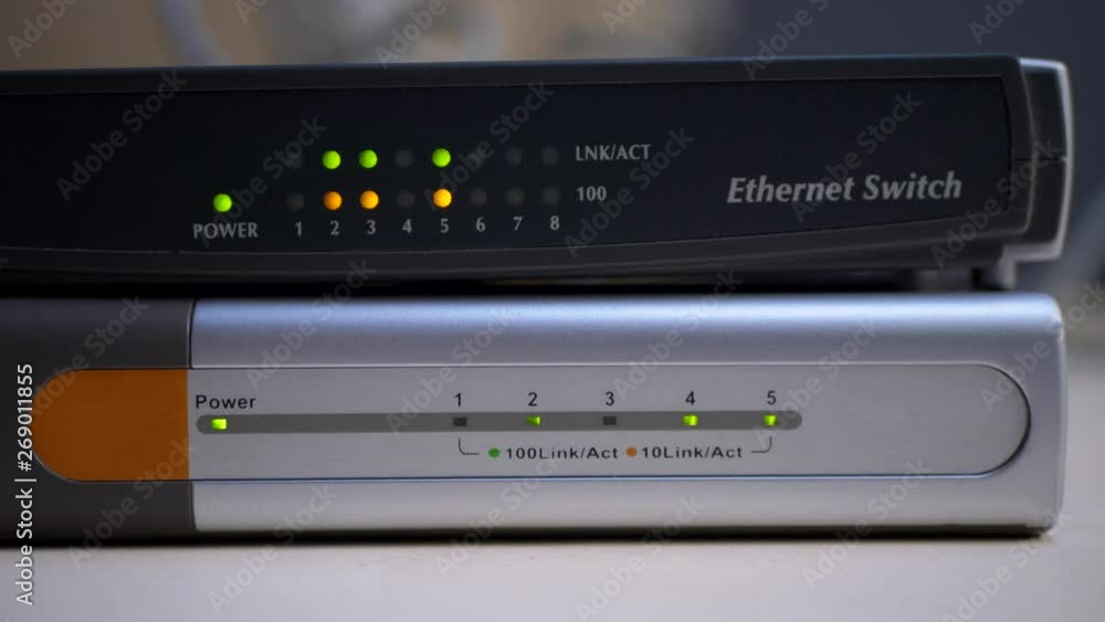 Ethernet router starts work and blinks lights of connected data cables at office Ethernet router starts work and blinks lights of connected data cables at office