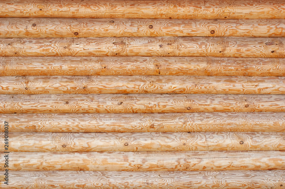 textured wooden background from boards of logs textured wooden background from boards of logs