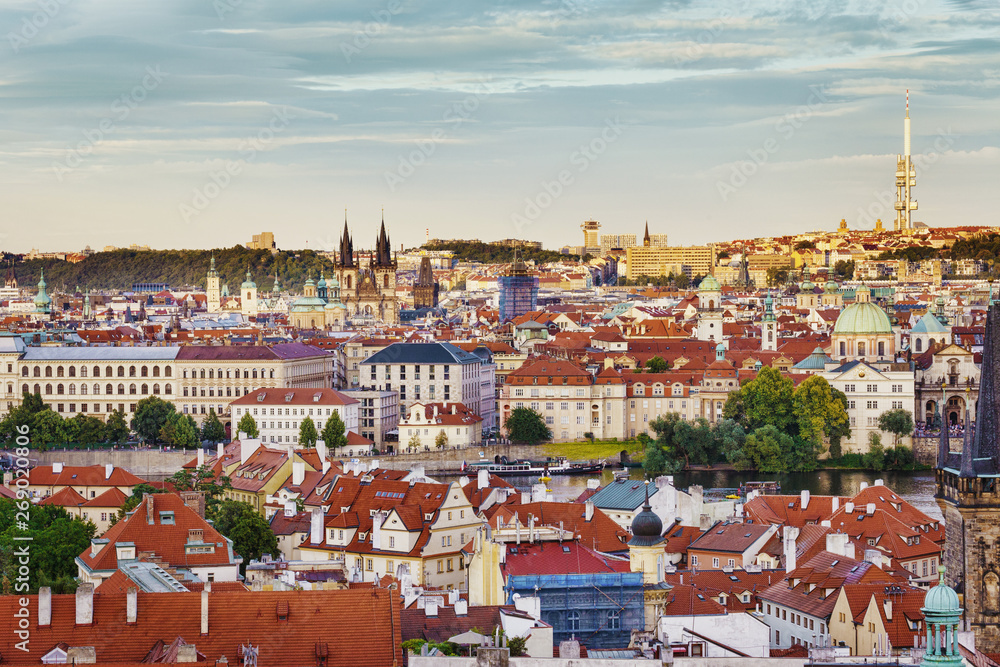 .View of the red roofs of old Prague, the Vltava river and the embankment. Czech Republic.