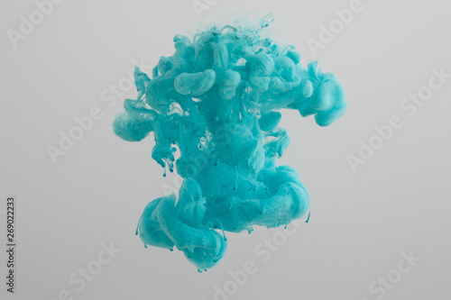 blue paint splash isolated on grey background