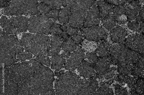 Cracked asphalt texture abstract background cracks on asphalt road