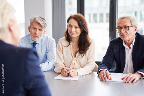 Photos Serious, business talks at conference table