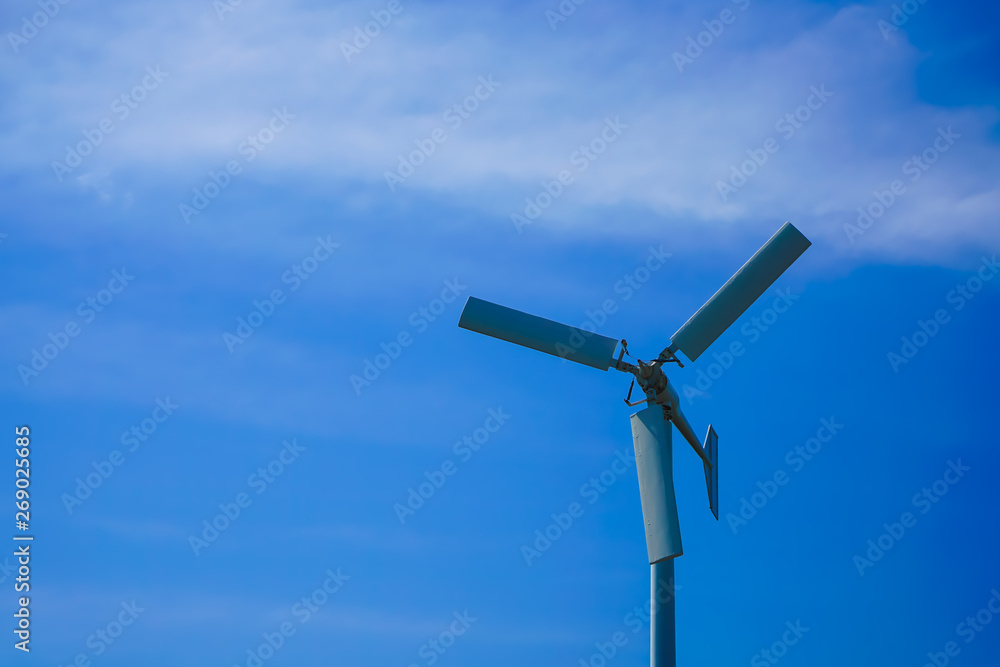 Large wind turbines are used to produce electricity. Used as a clean energy and beautiful sky Large wind turbines are used to produce electricity. Used as a clean energy and beautiful sky