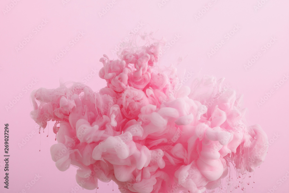 Close up view of pink smoky paint in water isolated on pink - obrazy, fototapety, plakaty 