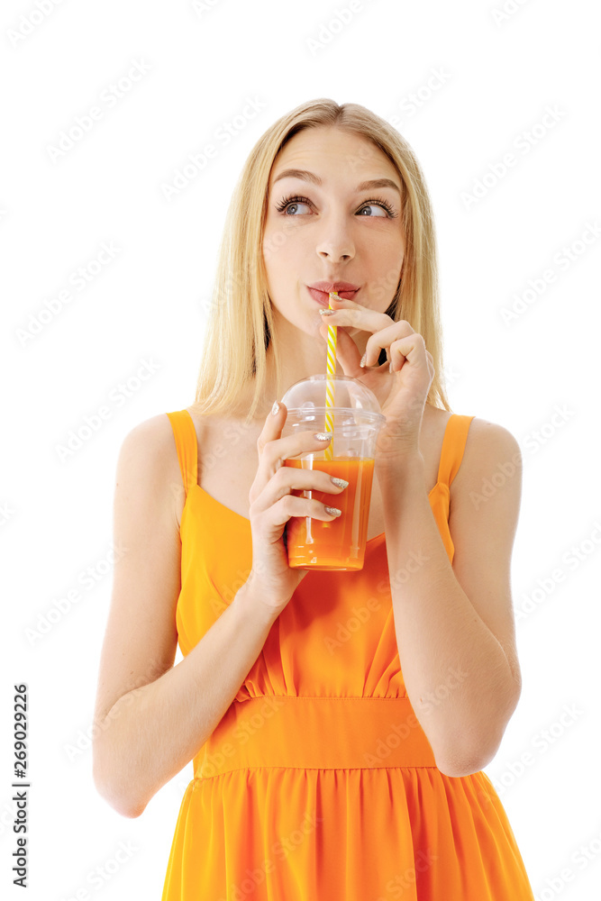 Beautiful young woman with fresh juice on white background Beautiful young woman with fresh juice on white background