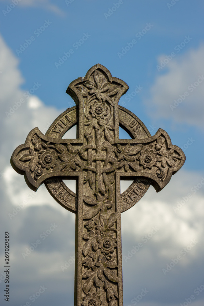 Detail of a Celtic Cross, a design that dates from the Middle Ages but is still a popular symbol in burial grounds and cemeteries because of it's ornate carving and symbolism
