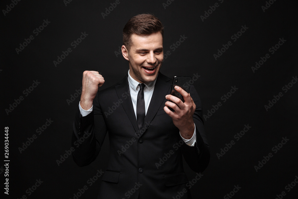 Confident attractive businessman wearing suit