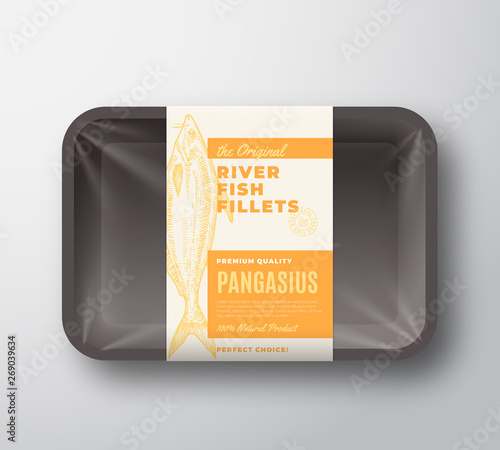 The Original Fish Fillets Abstract Vector Packaging Design Label on Plastic Tray with Cellophane Cover. Modern Typography and Hand Drawn Pangasius Basa Silhouette Background Layout.