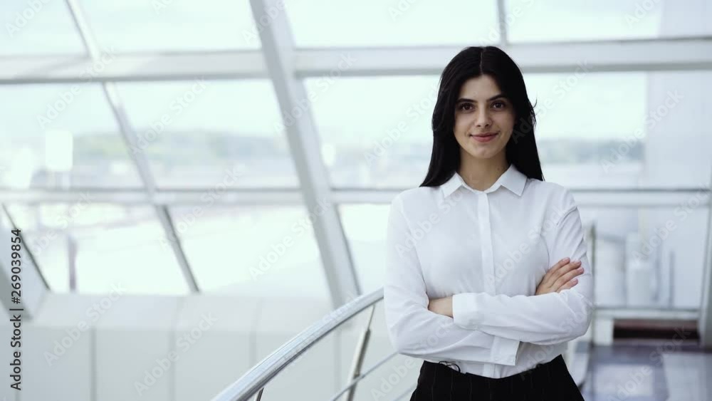 business lady is crossing arms in professional pose business lady is crossing arms in professional pose
