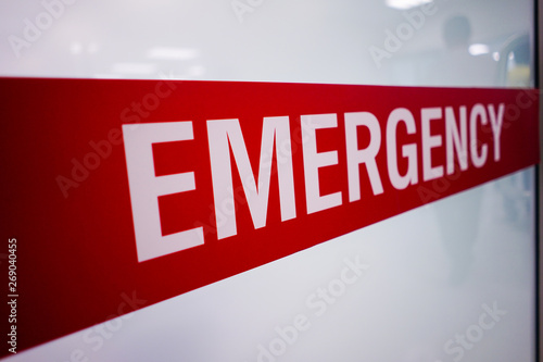 Red emergency room signs and patients who look scary photo