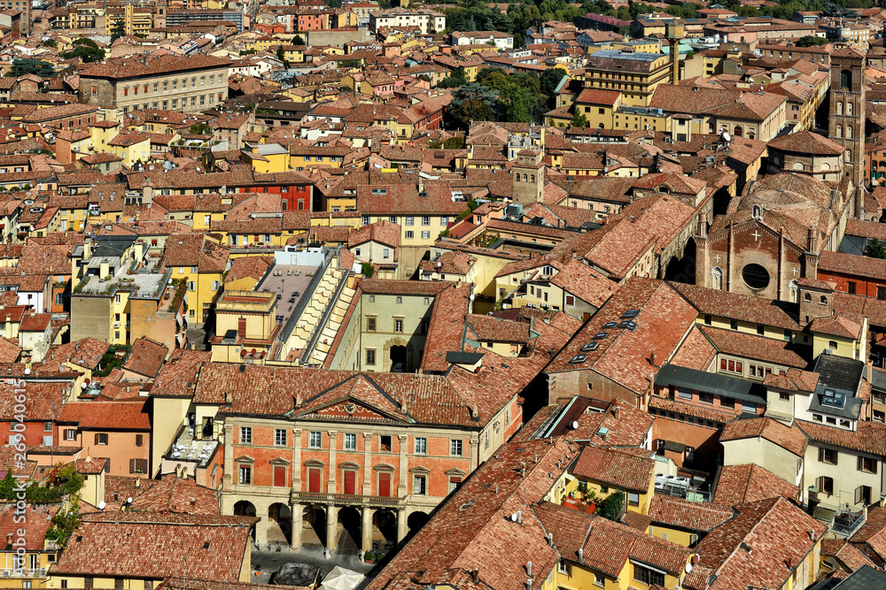 Aerial panoramic cityscape of Bologna, Italy, above rooftops of typical houses, ancient buildings and medieval towers