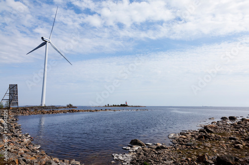 landscape with windmill and lighthouse