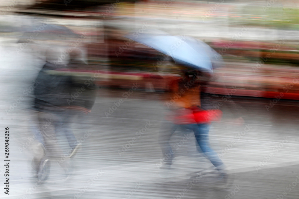 Walking under the rain with umbrella Walking under the rain with umbrella