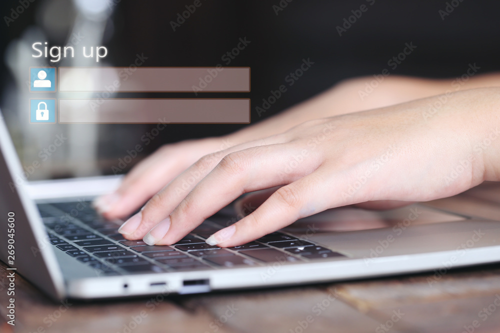 Young woman using laptop computer and sign up or log in username password in coffee shop,GDPR.cyber security and privacy concept Young woman using laptop computer and sign up or log in username password in coffee shop,GDPR.cyber security and privacy concept