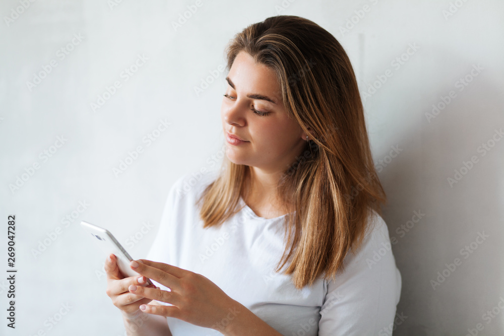 Young beautiful woman with smartphone Young beautiful woman with smartphone