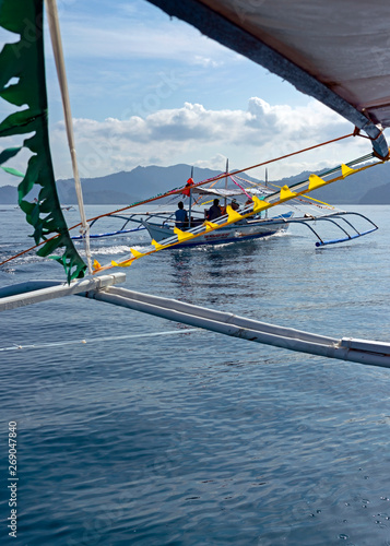 Paraws, double outrigger boats used in hauling tourists to the mouth of underground river in Palawan, UNESCO World Heritage Site as well as well as New7Wonders of Nature.