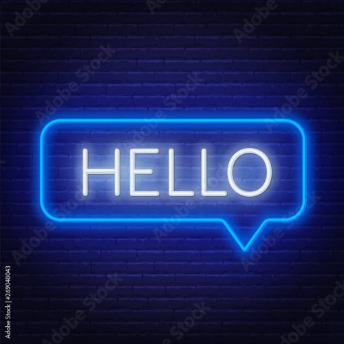 Neon sign of word hello in speech bubble frame on dark background. Light banner on the wall background.