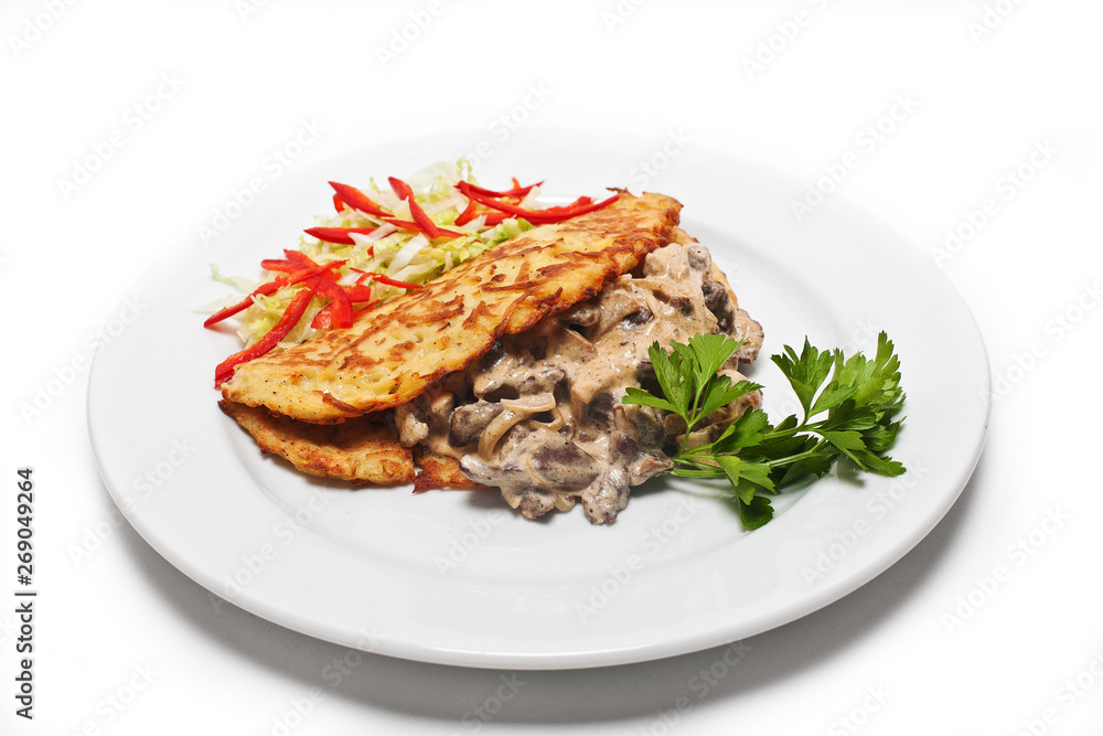 Served side dish on a white plate. Close-up. Isolated