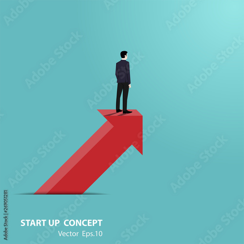 Businessman stand on arrow looking go to the future