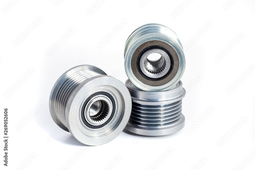 Freewheel alternator pulleys on isolated white background. Auto electrical parts. Freewheel alternator pulleys on isolated white background. Auto electrical parts.