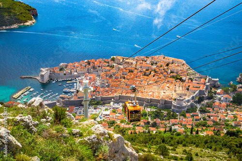 Obraz na płótnie Old town of Dubrovnik with cable car ascending Srt mountain, Dalmatia, Croatia w salonie