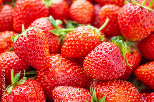 Fresh organic red ripe Strawberry fruit background closeup