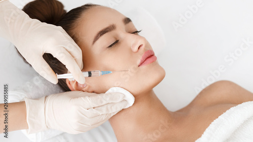 Anti Wrinkle Surgery. Young Woman Receiving Injection