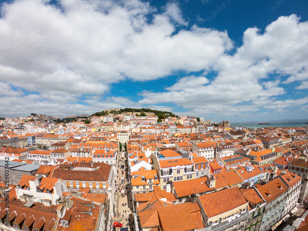 Aerial view on Buildings and street in Lisbona, Portugal. Orange roofs in city center