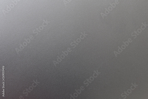 Surface of gray metal is smooth background.