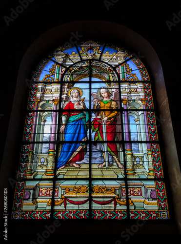 Stained glass. Madonna and Archangel Michael