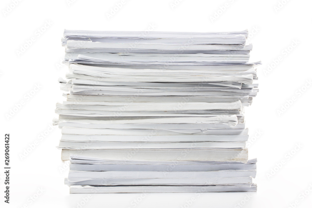 Close-up of papers stack isolated on a white background Close-up of papers stack isolated on a white background