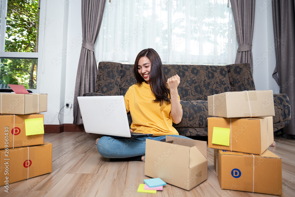beautiful asian young woman working on laptop computer at home, startup Online Marketing concept beautiful asian young woman working on laptop computer at home, startup Online Marketing concept