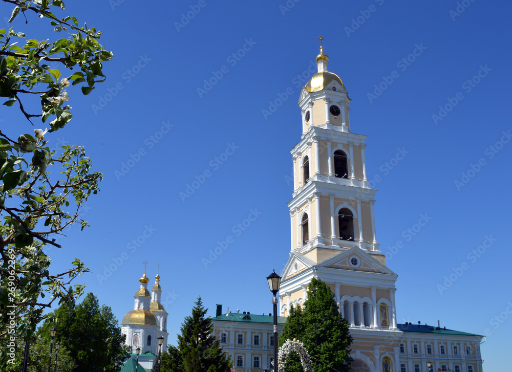 white stone Church Cathedral against the blue sky in summer in Sunny weather