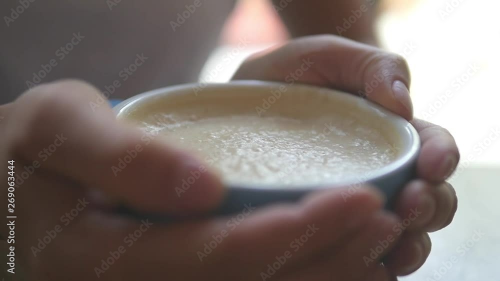 Hands holding a mug with delicious coffee. Hands holding a mug with delicious coffee.