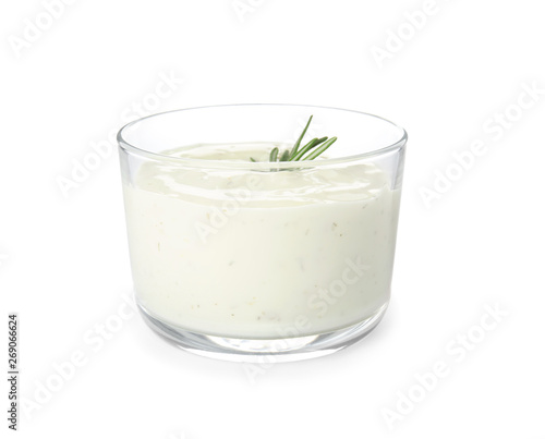Glass bowl of garlic sauce on white background