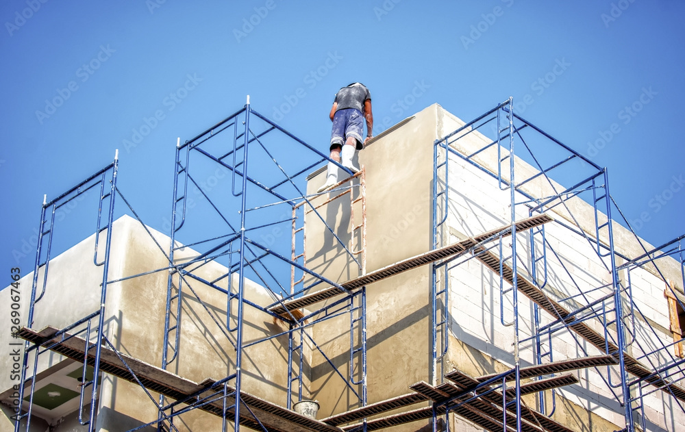 Apartment Building being Constructed with No Safety Equipment for Workers.