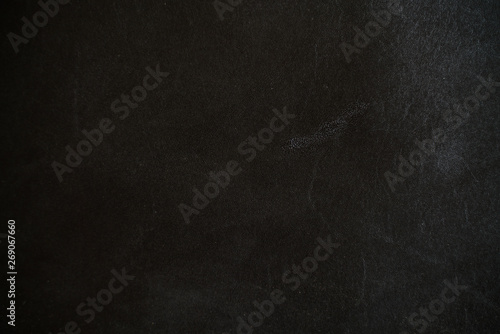 Genuine black cowhide leather background