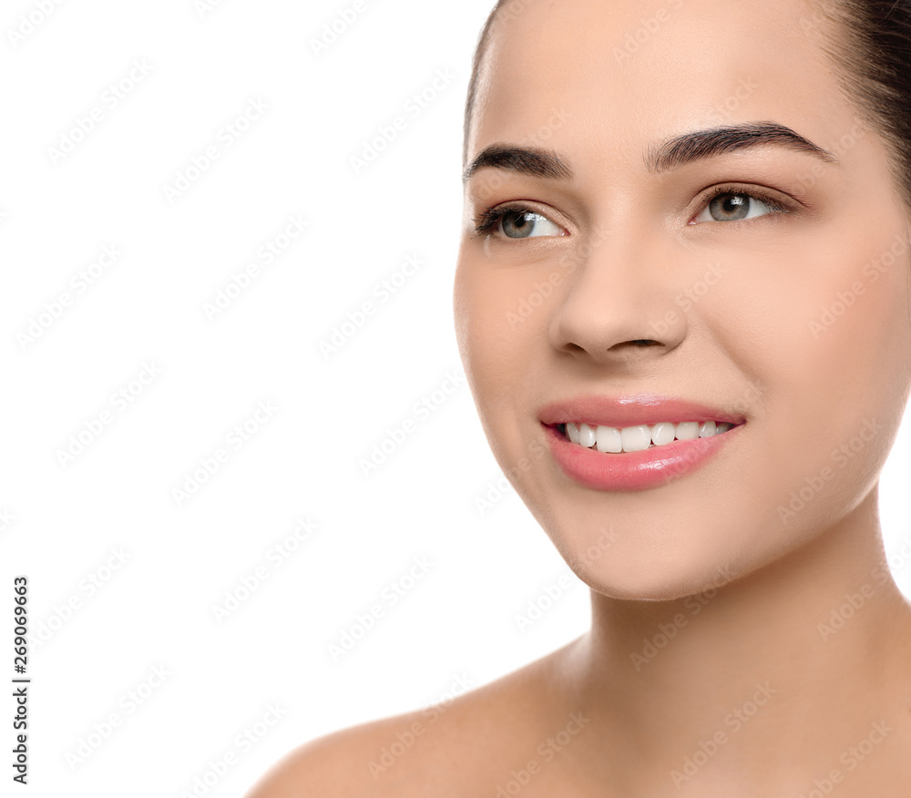 Portrait of young woman with beautiful face and natural makeup on white background, closeup Portrait of young woman with beautiful face and natural makeup on white background, closeup