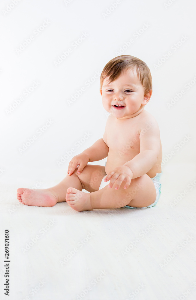 Portrait of cute, little chubby baby boy in diapers isolated on white background Portrait of cute, little chubby baby boy in diapers isolated on white background