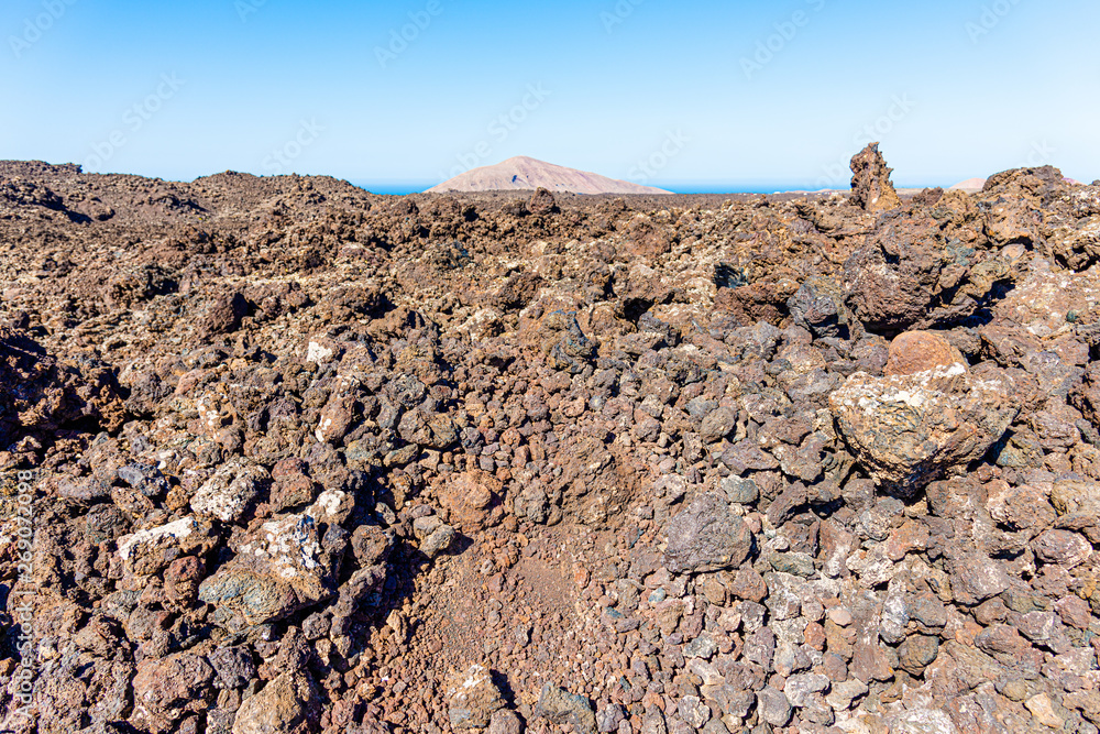 Timanfaya National Park,  Lanzarote, Canary Islands, Spain. Unique panoramic view of spectacular lava river flows.