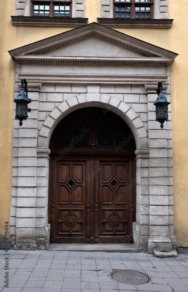 Antique doors on the face. Street in the city of Lviv Ukraine Antique doors on the face. Street in the city of Lviv Ukraine